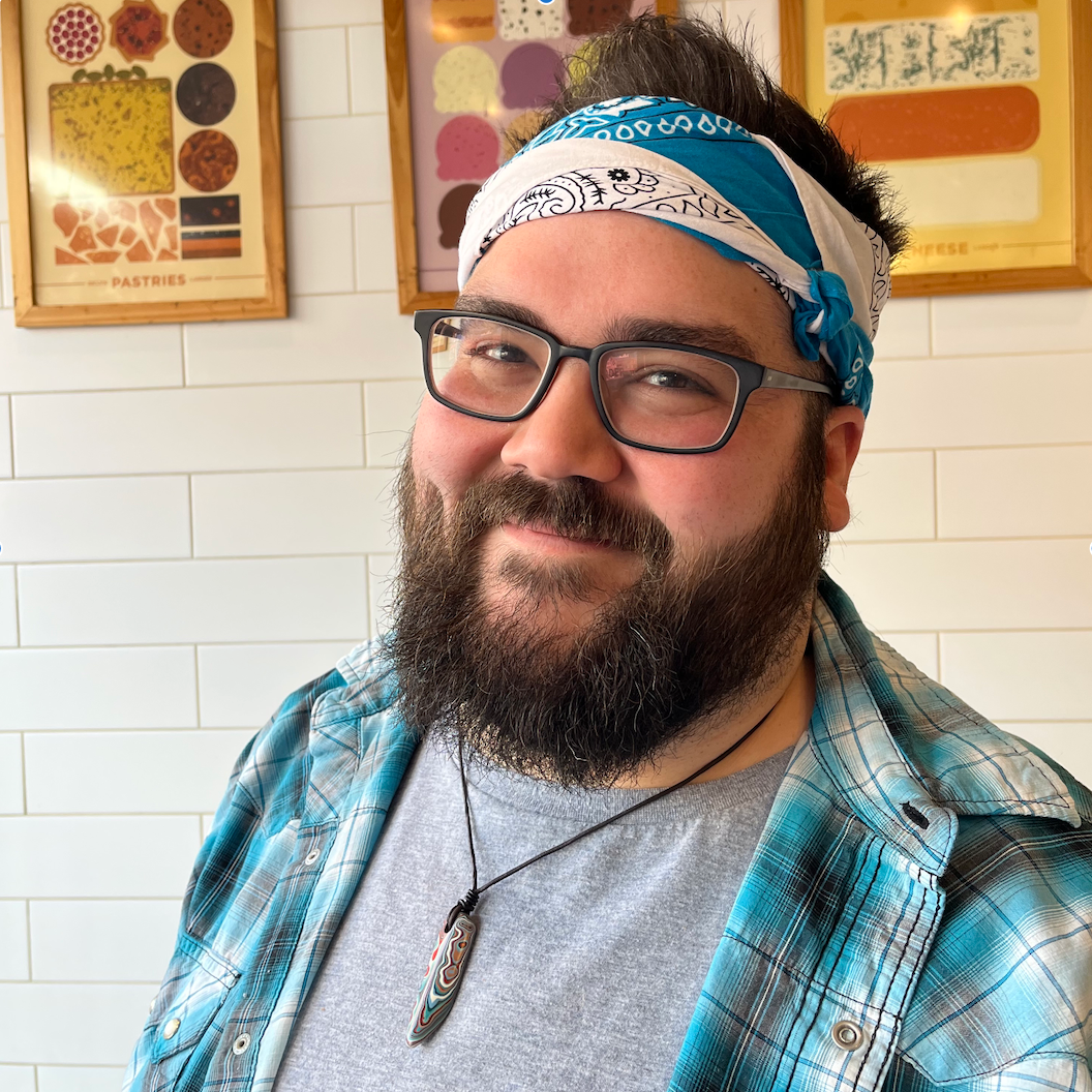headshot of John Muenz